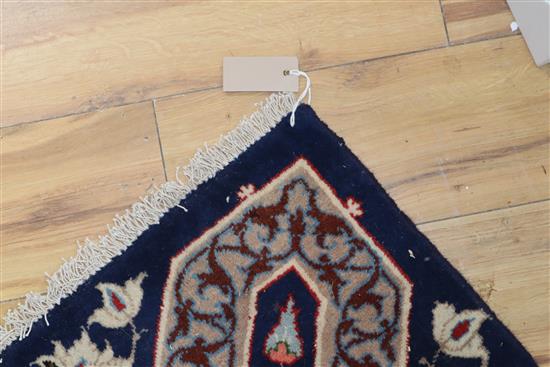 A Tabriz blue ground carpet, 410 x 272cm